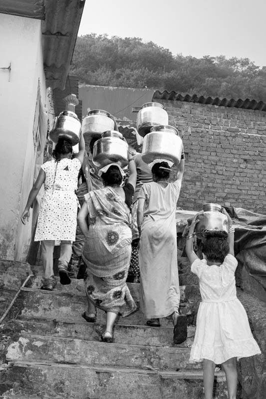 Human Right to Water in Mumbai - Drudgery of women and girls in an informal settlement located on hills